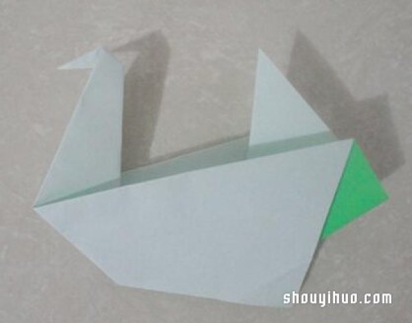 Illustration of an origami water bird. Tutorial on how to fold a water bird.