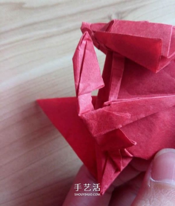 The process of folding the auspicious beast Kirin, the illustrated process of folding the Origami Tetsushi Kamiyas Kirin