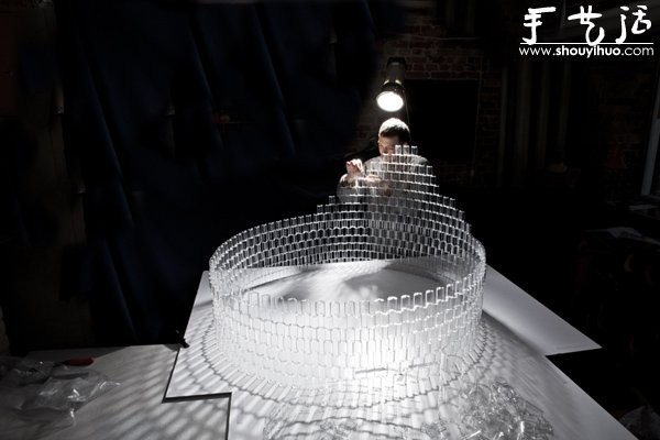 A giant chandelier made of transparent Lego bricks