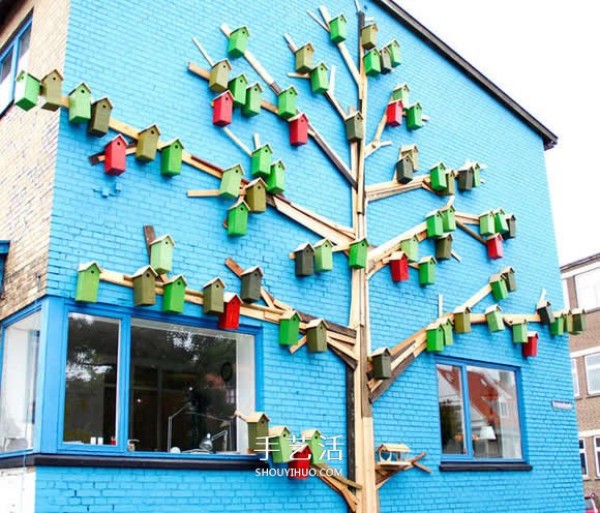 Recycle wood to create a colorful birdhouse for birds to find a place to live