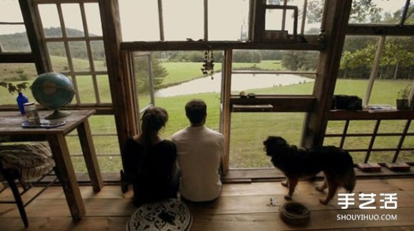 A dreamy lakeside house made up of all kinds of old windows