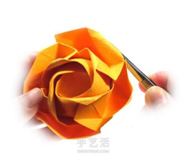 Transform and fold beautiful paper roses by hand on Kawasaki Rose