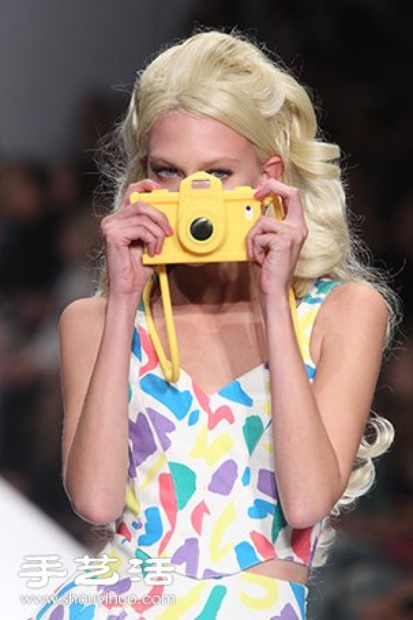 Barbie appears on the 2015 Milan Fashion Week spring and summer womens wear catwalk