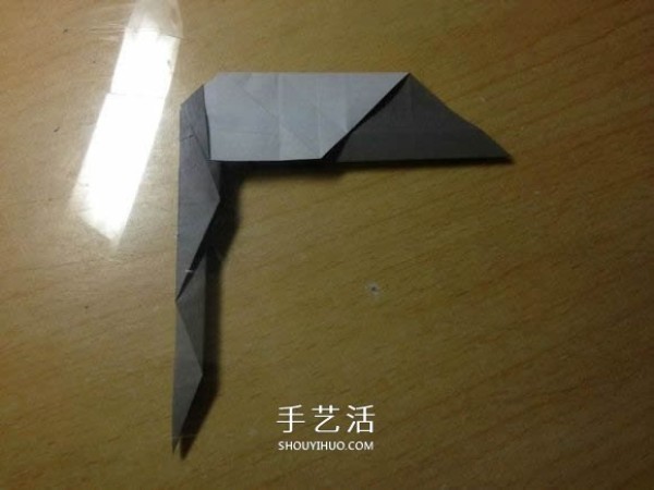 The origami method of an excavator illustrates the folding process of a manual excavator