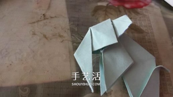 How to fold a three-dimensional elephant with diagrams and instructions for folding origami and a standing elephant