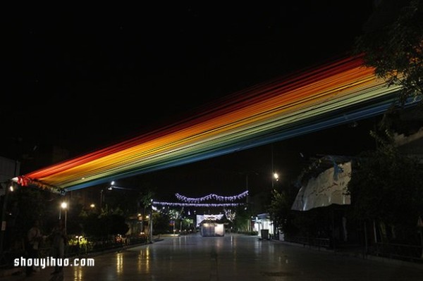 Look up and see a rainbow, a beautiful corner created by 150 colorful ribbons