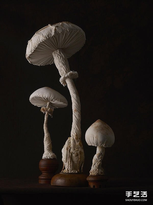 Female master worker "Mr. Bird" sews cloth sculptures of forest-type fungi