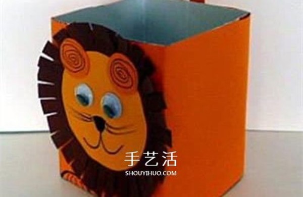 Using waste beverage boxes to make a cute lion storage box by hand