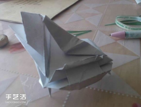 Origami diagram of a grand piano, step-by-step instructions on how to fold a three-dimensional grand piano