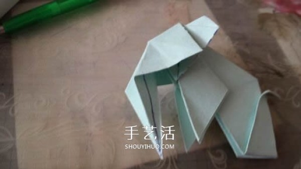 How to fold a three-dimensional elephant with diagrams and instructions for folding origami and a standing elephant