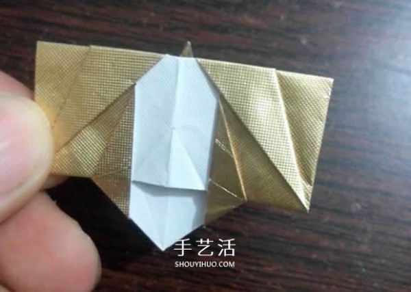 Using cigarette box paper waste and making origami three-dimensional owl illustration step-by-step