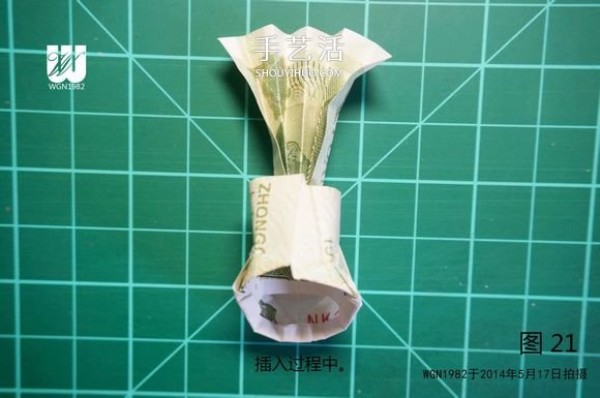 One dollar bill origami tutorial: Illustration of how to fold a sprout in a shoe