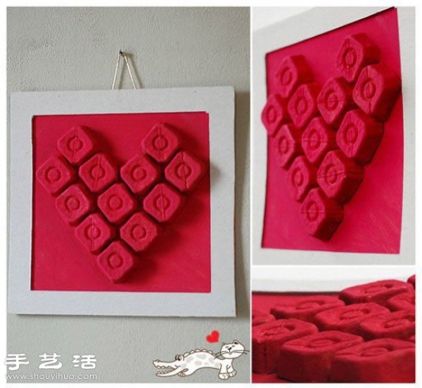 Egg trays are turned into treasures to make three-dimensional heart-shaped decorative paintings