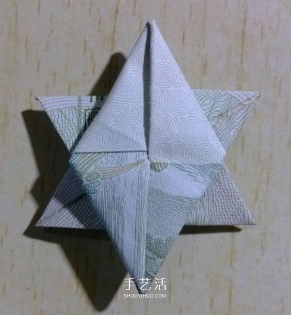 One-yuan banknote origami six-pointed star complex banknote six-pointed star folding method