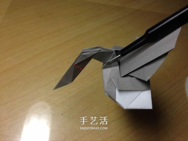 The origami method of an excavator illustrates the folding process of a manual excavator