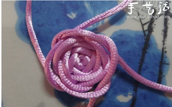 Handmade roses with auspicious knots