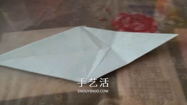 How to fold a three-dimensional elephant with diagrams and instructions for folding origami and a standing elephant