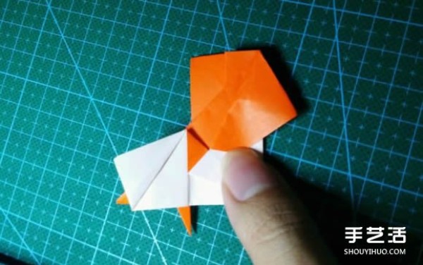 How to make an origami kingfisher with detailed instructions on how to fold a kingfisher