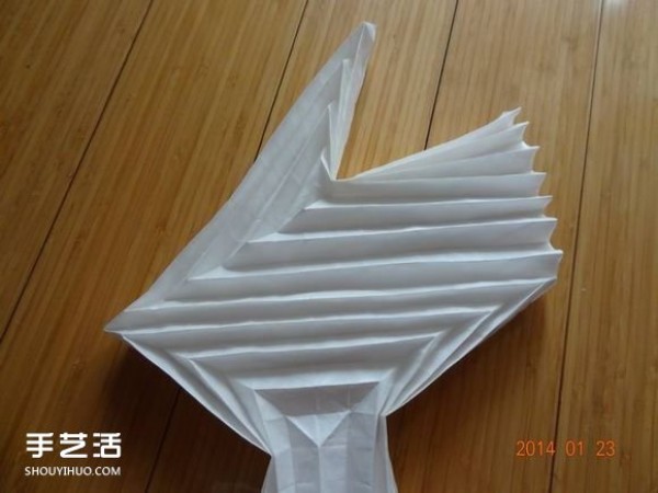 How to fold a paper crane with a step-by-step guide and a tutorial on how to make an origami crane by hand