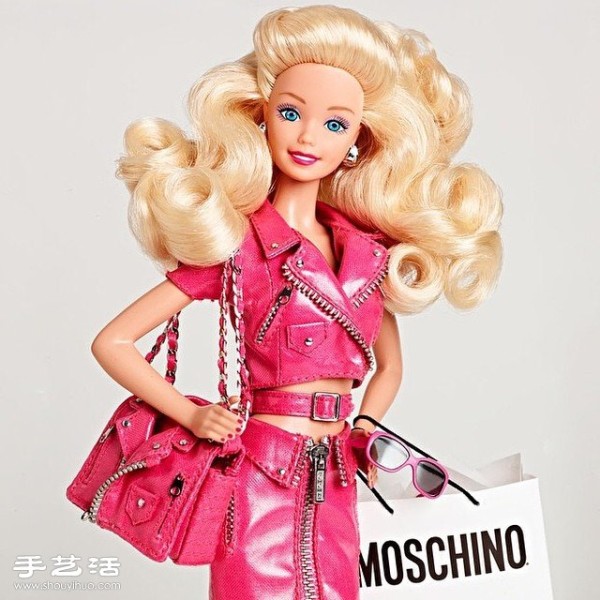 Barbie appears on the 2015 Milan Fashion Week spring and summer womens wear catwalk