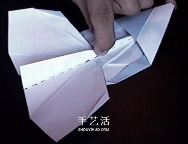 A detailed illustration of how to fold an Avengers paper plane or an origami fighter plane