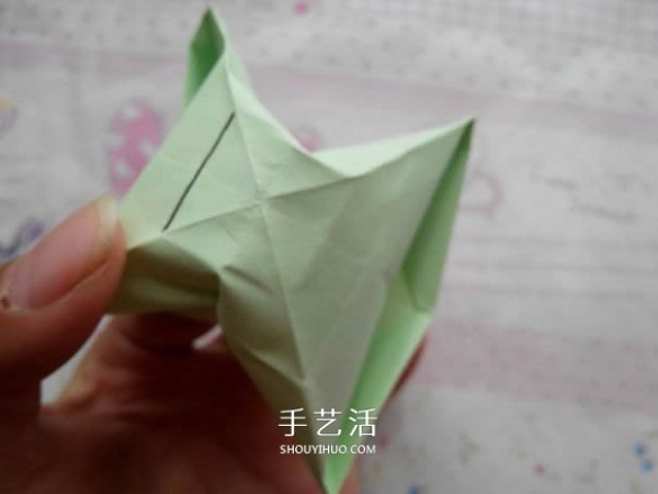 A tutorial on how to fold a diamond rose and a tutorial on how to fold a diamond rose