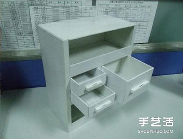 Illustration of the process of using carton waste to make useful cabinets by hand