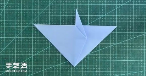 Handmade origami girls head illustration, step-by-step folding method for a girl with short hair