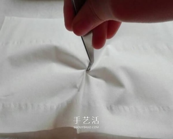 It only takes a few minutes to fold a rose from a napkin