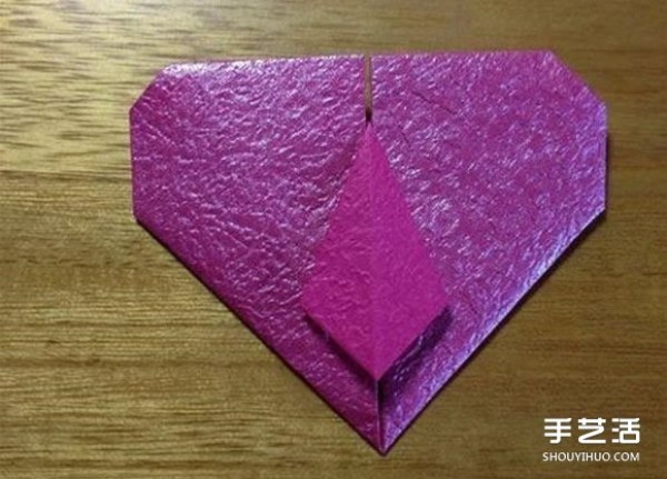 Illustration of how to fold a tie with a heart. Beautiful tie with a heart.Origami tutorial