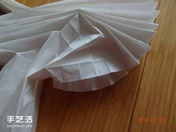 How to fold a paper crane with a step-by-step guide and a tutorial on how to make an origami crane by hand