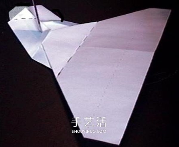 A detailed illustration of how to fold an Avengers paper plane or an origami fighter plane