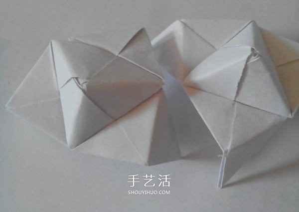 Illustration of folding a polyhedral cube, step-by-step diagram of origami cube