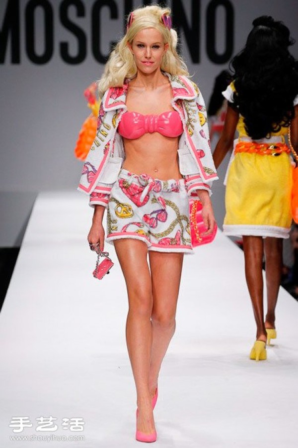 Barbie appears on the 2015 Milan Fashion Week spring and summer womens wear catwalk