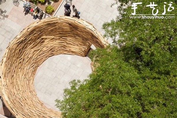 10,000 wooden planks are used to make a DIY birds nest-shaped building