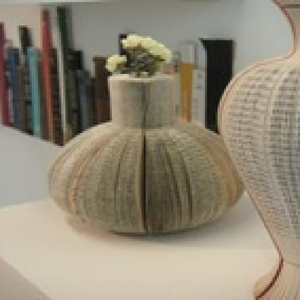 vases, lamps and benches made from discarded books