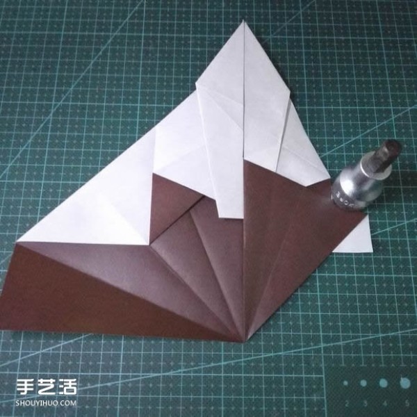 Handmade origami fish fish illustrates how to fold a complex tropical horsefish