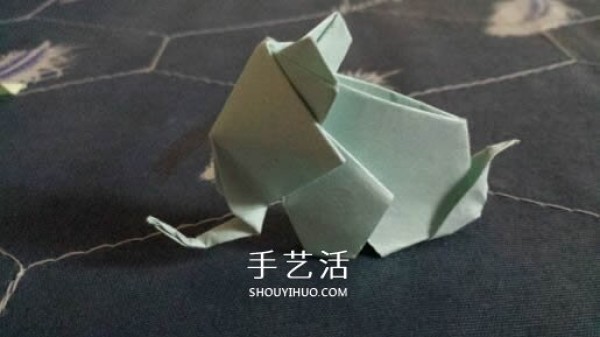 How to fold a three-dimensional elephant with diagrams and instructions for folding origami and a standing elephant