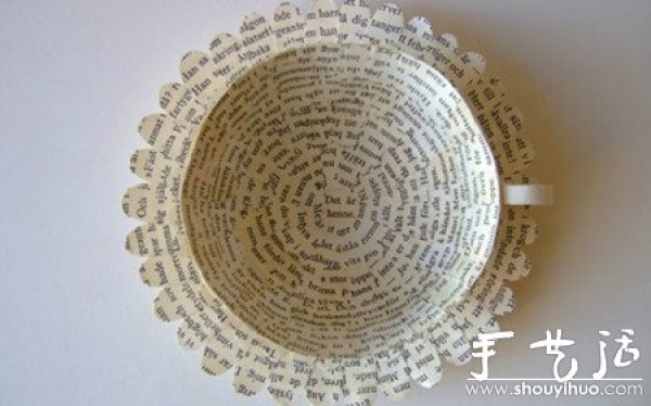 Recycling book pages to make exquisite hand-made tea cups