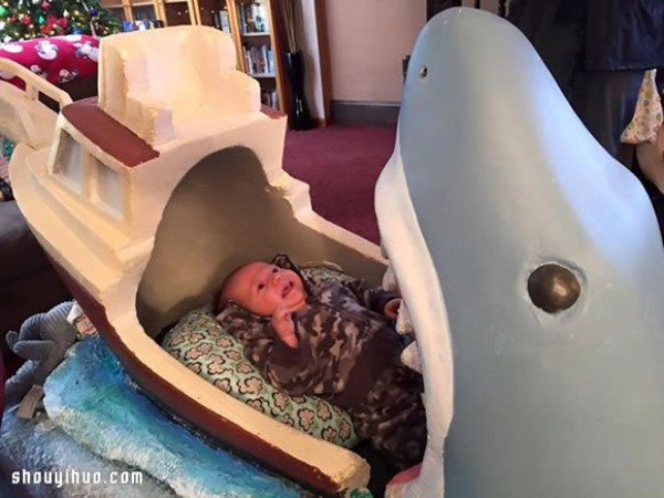 The warmest gift for your nephew is a great white shark engraved crib