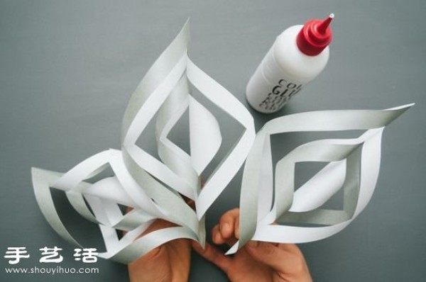 Tutorial on making super beautiful 3D snowflakes by cutting paper by hand