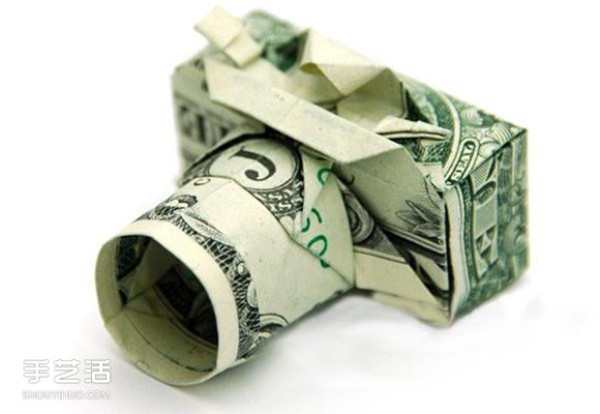 Paper money origami camera illustration and a detailed explanation of how to fold a dollar bill into a camera