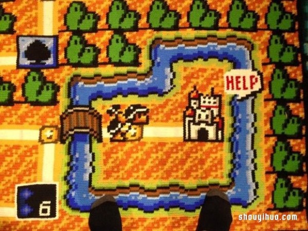 Six years to hand-knit a huge Super Mario map blanket