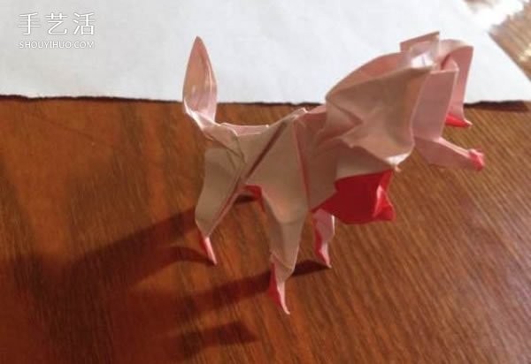 How to fold an origami poodle and illustrate the folding process of a three-dimensional poodle