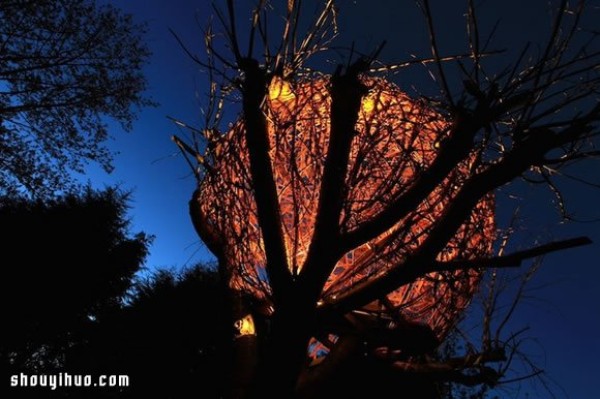 Beautiful birds nest-shaped willow treehouse on the withered cherry tree