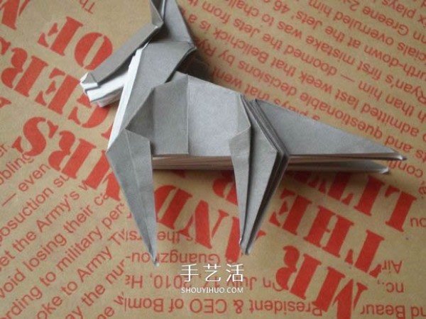 Illustrations of how to fold a cute puppy. Step-by-step pictures of origami puppies.