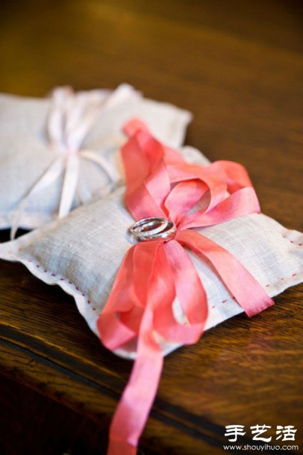 Handmade linen ring pillows commonly seen in forest weddings