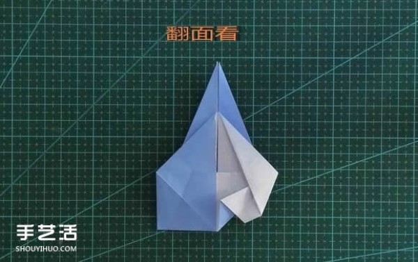 Handmade origami girls head illustration, step-by-step folding method for a girl with short hair