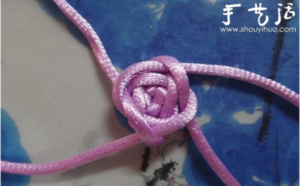 Handmade roses with auspicious knots