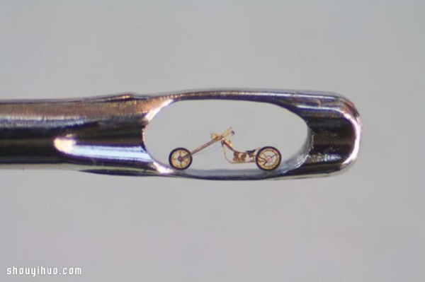 The art of ultra-micro carving in the eye of a pin